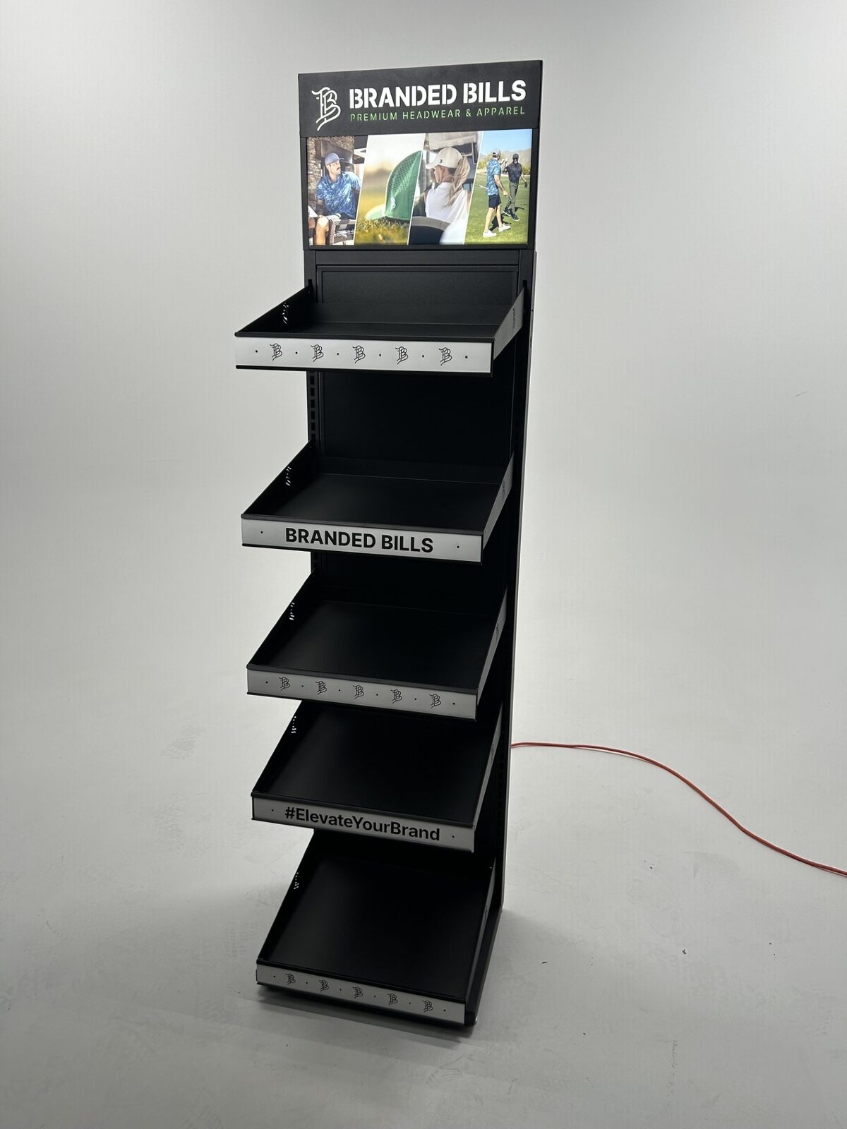 Illuminated Branded Bills premium headwear retail display fabricated by Creative Display Works