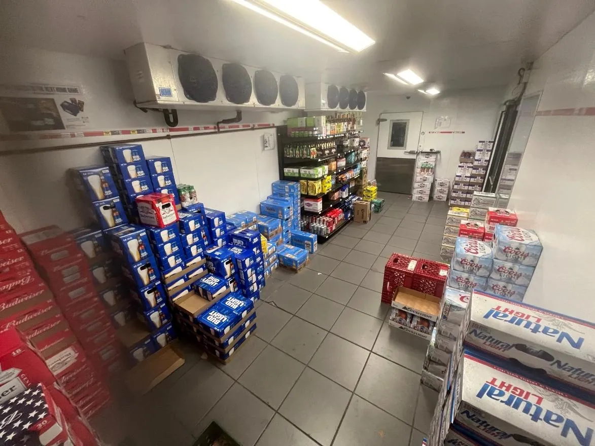 Before: Cluttered walk-in cooler