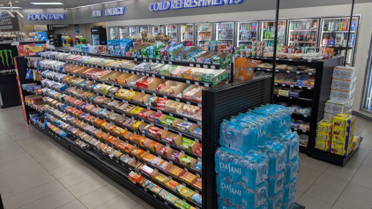 LED candy racks on 54 inch gondola with water on end cap unit