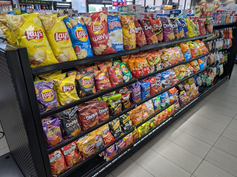 Chip shelves on 54 inch low profile gondola